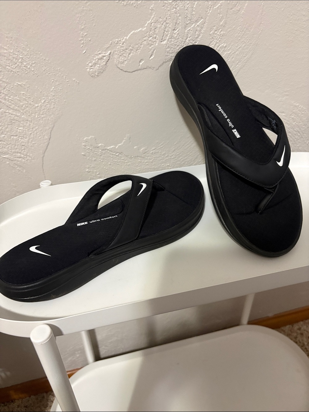 Nike Women’s Black Foam Thong Sandals with White Swoosh